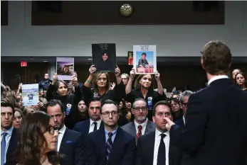  ?? The Washington Post ?? Meta chief executive Mark Zuckerberg a Senate hearing last week, where he faced family members holding photos of children they said were harmed by social media