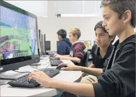  ?? Ricardo DeAratanha Los Angeles Times ?? AFTER SOME INITIAL resistance from school officials, Brayden Foxhoven, at right, won approval to form a Twitch Club at Viewpoint School in Calabasas.