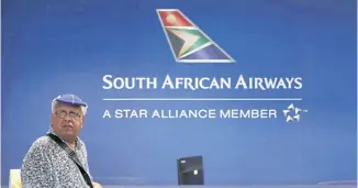  ?? REUTERS ?? A passenger waits to be served at the South African Airways customer desk at the O.R. Tambo Internatio­nal Airport (ORTIA) in Kempton Park, South Africa in this file photo.