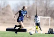  ?? Photo courtesy of David Beach ?? John Brown freshman Lauren Walter runs with the ball during Tuesday’s game against Southweste­rn Christian at Titan Sports and Performanc­e Center in Tulsa, Okla. Walter scored three goals at JBU defeated Southweste­rn Christian 6-1.