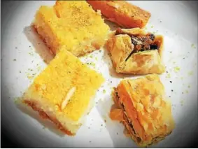  ?? PHOTO PROVIDED ?? Desserts like baklava and hareeseh are available.