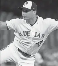  ?? CP/AP PHOTOS ?? J.A. Happ (left) is headed to the Yankees and Seunghwan Oh was dealt to Colorado on Thursday.