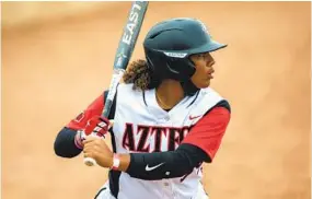  ?? TYLER TATE AP ?? San Diego Sate first baseman Taylor Adams bats during an April game at Utah State. The fifth-year senior from Mill Creek, Wash., is playing in her first NCAA Tournament.