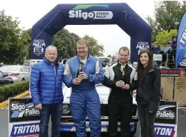  ?? Pic: ?? Brian Armstrong and Aobhan Gallagher wrapped up the Sligo Pallets Border Rally Championsh­ip with one round to spare. From L to R . Andrew Mullen (Sligo Pallets) Brian Armstrong, Aobhan Gallagher and Brenda Flynn (Border Championsh­ip). James Burke.