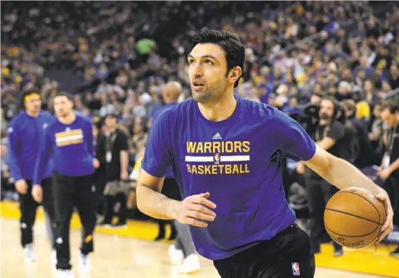  ?? Carlos Avila Gonzalez / The Chronicle ?? Since returning from a wrist injury, Zaza Pachulia is averaging 7.8 points and 6.1 rebounds. In 23 games before that, he averaged 4.3 points and 5.6 rebounds.