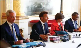  ?? Break. Photograph: Mohammed Badra/EPA ?? Emmanuel Macron, second from left, chairs his first cabinet meeting after the summer