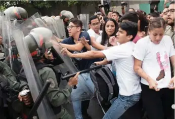  ?? AFP/GETTY IMAGES ?? Unrest is widespread in Venezuela, where President Nicolas Maduro is blamed for many of the country’s problems.