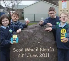  ?? Photo by Sinead Kelleher. ?? Sive O’Leary, James O’Sullivan, Fionn O’Leary and Darragh Murphy at St Michael’s National School in Sneem with Mr Bee, a character they have created in a bid to help households save electricit­y.