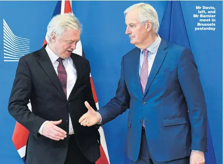  ?? Picture: EMMANUEL DUNAND/AFP ?? Mr Davis, left, and Mr Barnier meet in Brussels yesterday