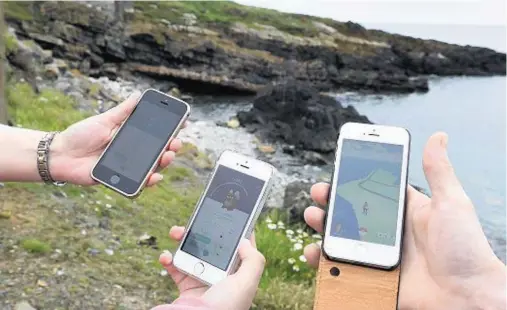  ?? Photograph­s: Kevin Emslie ?? CLIFFTOP: The area around Kinnaird Head Lighthouse where people are playing Pokemon Go.