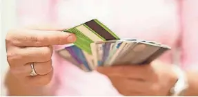  ??  ?? Credit card use has a significan­t effect on your credit score.