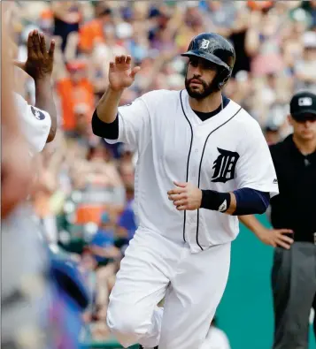  ?? ASSOCIATED PRESS ?? DETROIT TIGERS’ J.D. MARTINEZ ROUNDS THE BASES after a solo home run during the eighth inning of Sunday’s game against the Toronto Blue Jays in Detroit. Martinez was traded to the Arizona Diamondbac­ks on Tuesday.