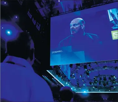  ?? Postmedia News ?? Steve Ballmer, CEO of Microsoft Corporatio­n, is projected on a large screen at the 2012 Microsoft Worldwide Partner Con
ference at the Air Canada Centre in Toronto Monday. The company will buy Perceptive Pixel Inc.