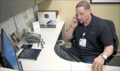  ?? Alexandra Wimley/Post-Gazette ?? A training program at the Energy Innovation Center gave Paul Davis the opportunit­y to start as a floor technician at the UPMC hospital and then be promoted to a supervisor of UPMC Shadyside Environmen­tal Services.