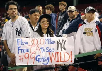  ?? Winslow Townson/Getty Images ?? Having fans will turn the volume up on the postseason “from a 10 to a 12,” said Yankees slugger Aaron Judge, who had a cheering section at Tuesday night’s game in Boston.