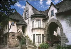  ??  ?? CLOCKWISE FROM ABOVE Normandy Village, an apartment complex in Berkeley built 1926–28 by William R. Yelland, evokes rural villages in Northern France, patterned on war memories. A bulging dovecote echoes turrets. Inside a house by W.W. Dixon.