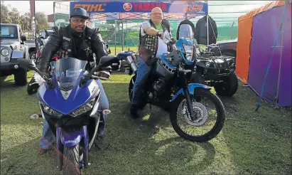  ?? Picture: SIBONGILE NGALWA ?? FULLY REVVED: Lonwabo Mguqulwa, left, of Alice United Riders and Rick Andrew, of the Christian Motorcylis­t Associatio­n, at the Golden Stallion Rally in East London