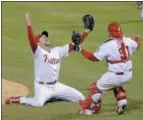 ?? AP FILE ?? With members of the 2008 World Series championsh­ip team like Brad Lidge and Carlos Ruiz on hand over the weekend, the current Phillies are beginning to have a similar look as a young team on the rise.