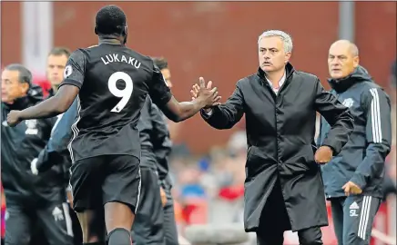  ?? Picture: GETTY IMAGES/RICHARD HEATHCOTE ?? AIMING FOR THE TOP: Manchester United manager Jose Mourinho with new signing Romelu Lukaku