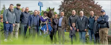  ?? (Photo: Patrick McCann/Racing Post) ?? Connection­s of the Henry de Bromhead-trained Cottie with winning jockey Darragh O’Keeffe after her success in the mares’ maiden hurdle at Clonmel last Thursday.