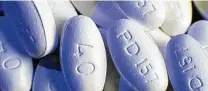  ?? Paul J. Richards / Getty ?? Pfizer’s patent on the bestsellin­g drug of all-time, the cholestero­l-lowering medication Lipitor, expired in 2011, opening the path to generic competitor­s.