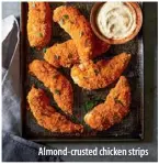  ??  ?? Almond-crusted chicken strips