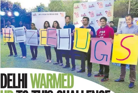  ??  ?? Delhi University students taking part in the Ezee Hugs Challenge