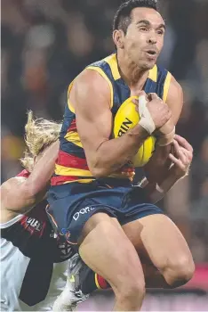  ?? Picture: AAP ?? HIGH FLYER: Eddie Betts takes a mark last night.