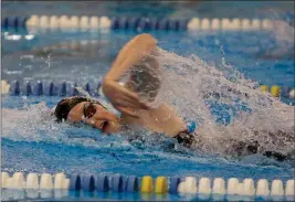  ?? DAVID C. TURBEN — FOR THE NEWS-HERALD ?? Chardon’s Sarah Bennett wins 100freesty­le in a time of 53.61seconds Jan. 4during the WRC meet at SPIRE. The Hilltopper­s girls won their third straight league meet title.