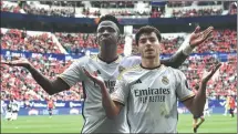  ?? AP ?? Real Madrid’s Vinicius Junior (left) and Brahim Diaz celebrate the latter’s goal in a 4-2 win over Osasuna on Saturday.