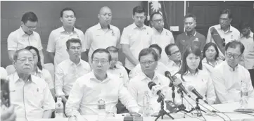  ??  ?? Guan Eng (seated, second left) and Shafie (right to Lim) when speaking to reporters at a press conference held here, yesterday.