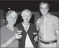  ??  ?? Martha Sutherland of Fayettevil­le with Carolyn Newbern and Historic Preservati­on Alliance of Arkansas board member John Greer Jr., both of Little Rock