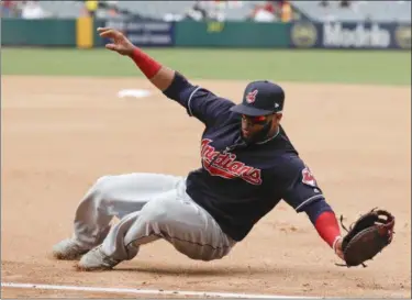  ?? THE ASSOCIATED PRESS FILE ?? Indians manager Terry Francona likes first baseman Carlos Santana’s attitude and defense. Santana will become a free agent after the World Series.