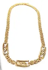  ??  ?? Gargantill­a estilo Cartier con panteras en
oro de 14 quilates