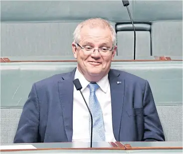  ?? EPA ?? Prime Minister Scott Morrison sits during a division on the government’s Encryption Bill at Parliament House yesterday.