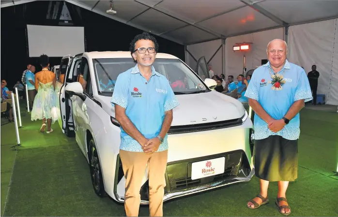  ?? Picture: REINAL CHAND ?? Rosie Holidays Managing Director Tony Whitton (left) with Minister for Tourism Viliame Gavoka launch the Rosie Holidays Electric Vehicle Fleet at the Rosie Transport Hub in Namaka Industrial Subdivisio­n in Nadi.