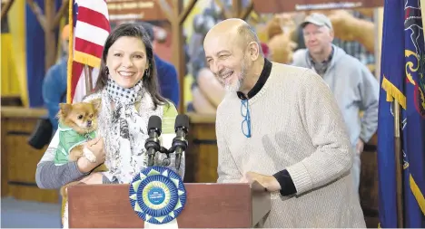  ?? PAINTERNET­NEWS SERVICE ?? Husband and wife sculptors Jim Victor and Marie Pelton made this year’s Pennsylvan­ia Farm Show butter sculpture from more than 1,000 pounds of butter.