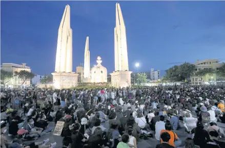  ?? WICHAN CHAROENKIA­TPAKUL ?? In this July 18 photo, several hundred pro-democracy students gather at Democracy Monument demanding political changes and an end to state intimidati­on. The youth movement looks unlikely to stop without a fight.