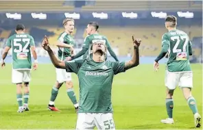 ?? AP ?? Panathinai­kos’ Willian Arao reacts after scoring against AEK Athens, during a Greek Super League football match at OPAP Arena stadium, in Athens, Greece, on Sunday, January 14, 2024.