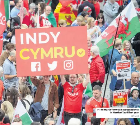  ?? Mark Lewis ?? > The March for Welsh Independen­ce in Merthyr Tydfil last year