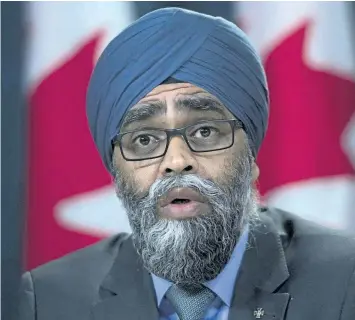  ?? SEAN KILPATRICK/THE CANADIAN PRESS ?? Defence Minister Harjit Sajjan speaks in Ottawa on Tuesday. New directives issued to the Canadian military and Canada’s super-secret electronic surveillan­ce agency limit — but don’t completely ban — the use of informatio­n likely acquired by foreign...