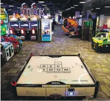  ?? CODIE MCLACHLAN ?? Cineplex opened two Rec Room locations, including one in West Edmonton Mall, pictured, featuring bars and games, to help boost its bottom line. Box office results are down 6.3 per cent for the year.