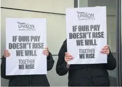  ?? REUTERS ?? Ambulance workers protest outside the Docklands Emergency Operating Centre, Newham Dockside, in London.