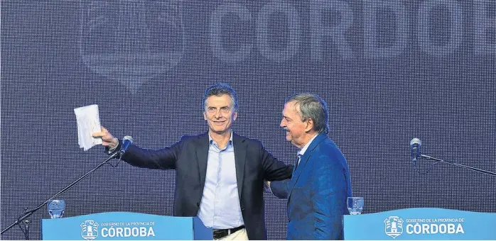  ?? (LA VOZ / ARCHIVO) ?? Protagonis­tas. Mauricio Macri y Juan Schiaretti no serán candidatos en octubre, pero serán fundamenta­les en la campaña electoral, tanto para Cambiemos como para el PJ.