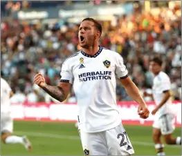  ?? PHOTO BY RAUL ROMERO JR. ?? Galaxy forward Billy Sharp celebrates after scoring a goal against St. Louis City SC in the second half of a match that ended in a 2-2draw at Dignity Health Sports Park on Sunday.