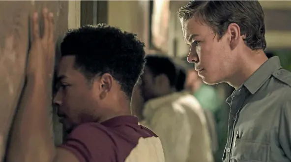  ??  ?? Will Poulter, right, plays the role of a white policeman in Detroit.