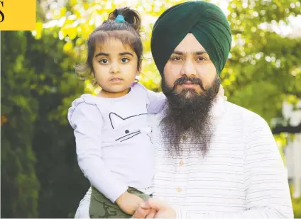  ?? FRANCIS GEORGIAN / PNG STAFF ?? Prabhjot Singh, with daughter Erenjot Kaur, is a Sikh priest from India now living in Abbotsford, B.C. Singh says he paid a local temple $29,000 to get a work permit for a non-existent job. He also claims that temple leaders threatened him after he complained.