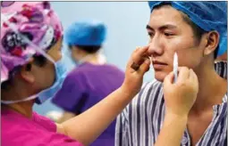  ?? PROVIDED TO CHINA DAILY ?? A client prepares to have facial cosmetic surgery at a hospital in Qingdao, Shandong province.