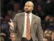 ?? SETH WENIG — THE ASSOCIATED PRESS FILE ?? In this file photo, then-New York Knicks head coach Derek Fisher looks on during the first half of the NBA basketball game in New York. A year after being fired, Fisher is back in NBA arenas at the TV table.What he really wants is to be back in the...