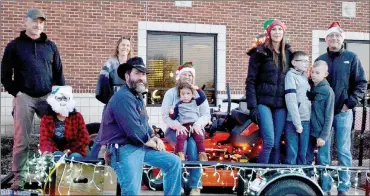  ?? TIMES photograph­s by Annette Beard ?? Family Rental’s float in the annual Pea Ridge Christmas Parade the first Saturday of December.